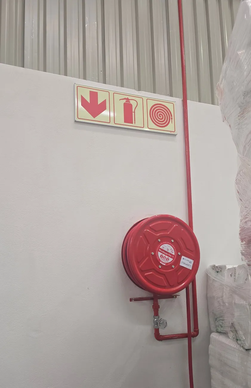 Fire hose reel and safety signage